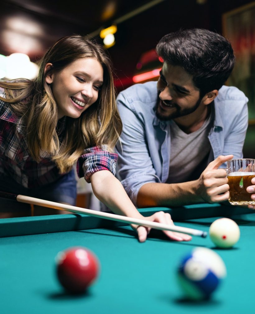 couple-dating-flirting-and-playing-billiard-in-a-pub.jpg couple-dating-flirting-and-playing-billiard-in-a-pub.jpg