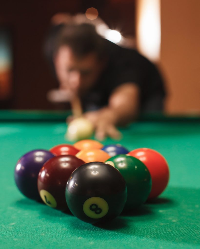 player-breaks-a-pyramid-in-billiards-.jpg player-breaks-a-pyramid-in-billiards-.jpg